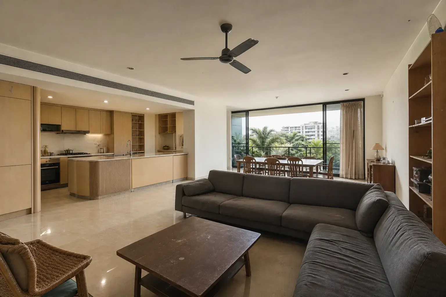 Fictional lived-in apartment living and dining room before a renovation concept